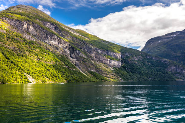 istock Water surrounded by mountains in the Geirangerfjord, Norway 1134996938