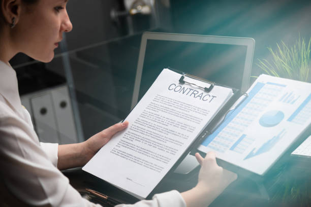 istock Young girl holding a contract and firm statistics 1134997120