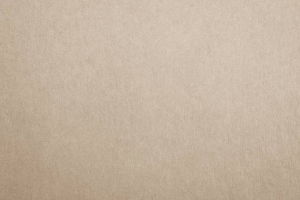 istock Recycled paper texture background in light cream brown color 1134997572