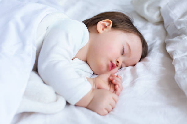 istock Sleepy toddler boy sleeping 1134998228