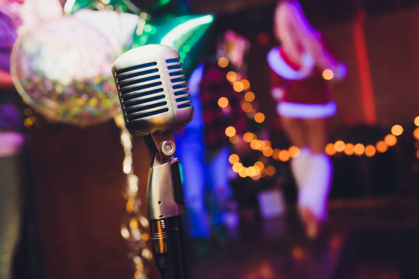 Microphone. Christmas music concept karaoke. Disco. New year celebration.