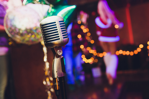 Microphone. Christmas music concept karaoke. Disco. New year celebration