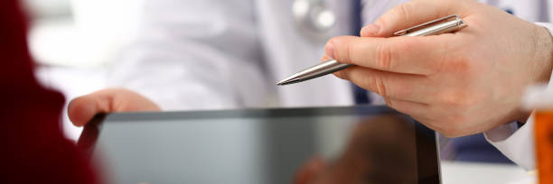 istock Female doctor hands hold and show digital 1134998669