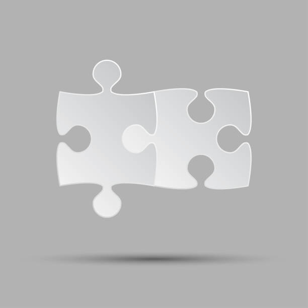istock Two puzzle separate pieces or parts. Symbol couple, together, love, wedding. 1134998956