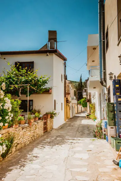 Narrow stone street in Kato Lefkara village. Larnaca District, Cyprus, summer.