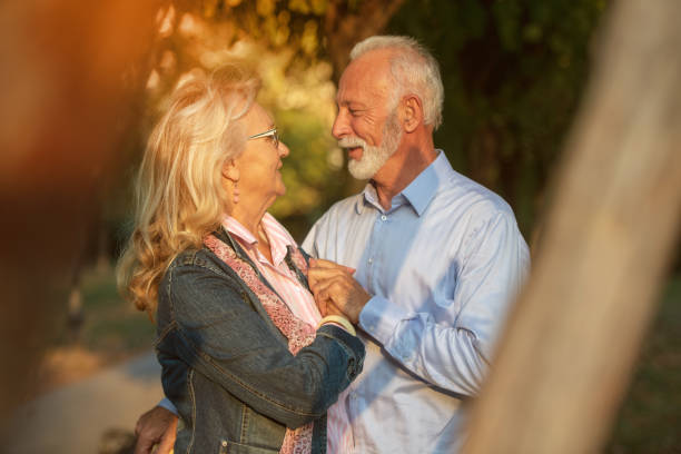 istock Happy senior couple in love. Park outdoors. 1135002607