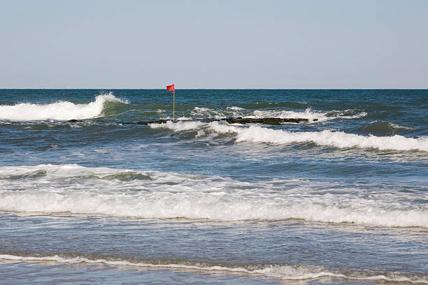 Flag in the Ocean stock photo