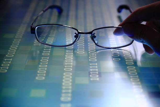 istock hand reaching for glasses on digital led display 1135006370