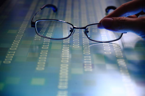 istock hand reaching for glasses on digital led display 1135006373