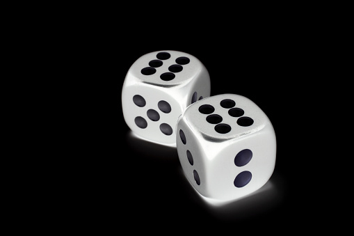 Two white dice on white background.