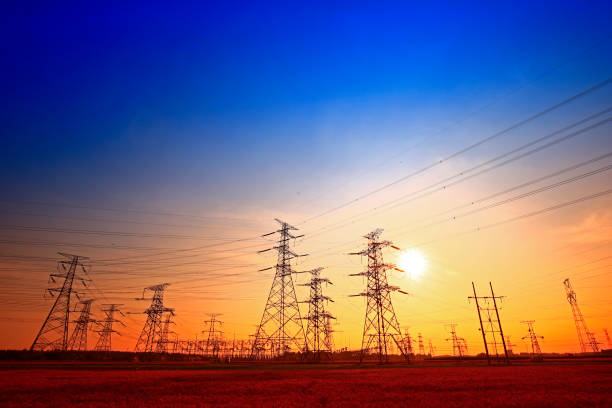 istock Electric tower, silhouette at sunset 1135009237