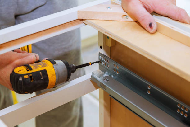 istock Hinge drawers assembly on kitchen cabinet door 1135016163