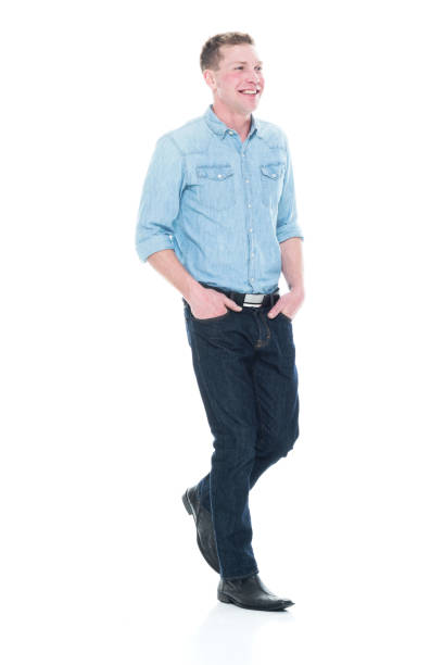 istock Handsome man with hands in pocket and walking 1135019776