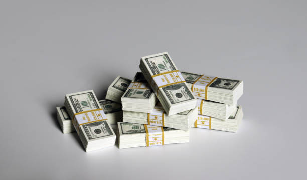 istock The pile of hundred dollar bills. 1135028593