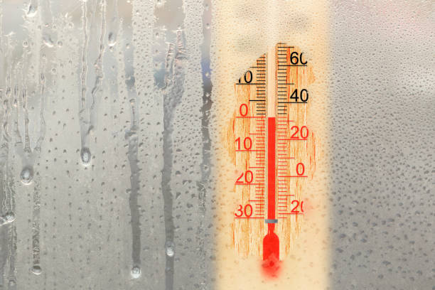 istock Outdoor thermometer shows 0 degrees celsius temperature in winter day. Outer thermometer on a frozen window 1135029964