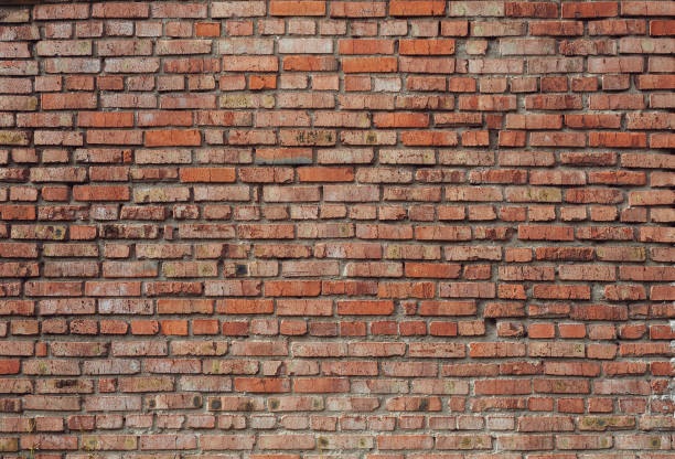 istock brick wall, from old, red, grungy brick background 1135033043