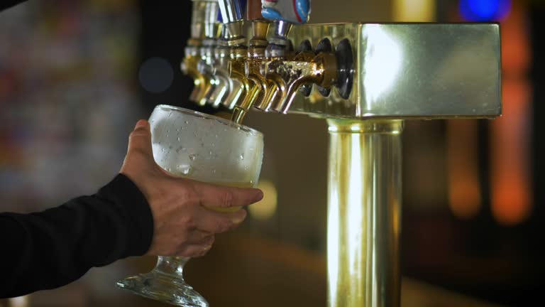 Bartender pouring beer