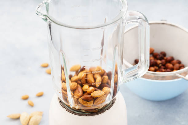 istock Blender and almonds soaked in water. Making vegan milk. 1135036260