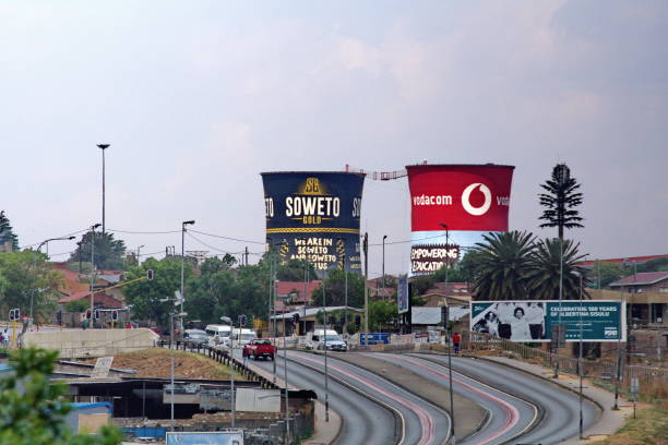 Soweto Towers above town Soweto Towers, seen above a major highway in Soweto, outside of Johannesburg, South Africa soweto stock pictures, royalty-free photos & images