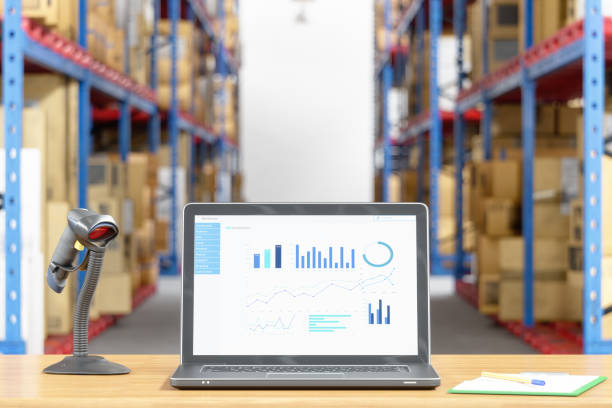 istock Laptop and barcode scanner on desk in a warehouse 1135036311