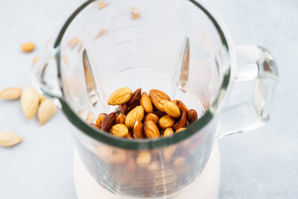 istock Blender with soaked almonds for making nut milk. 1135037012