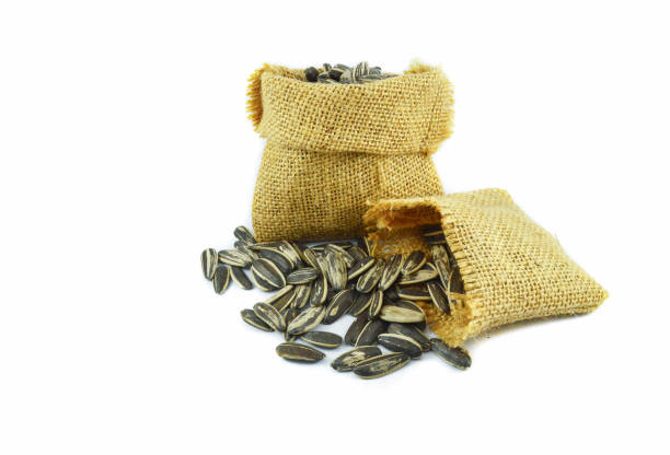 istock sunflower seeds in sack isolated on white background 1135037162
