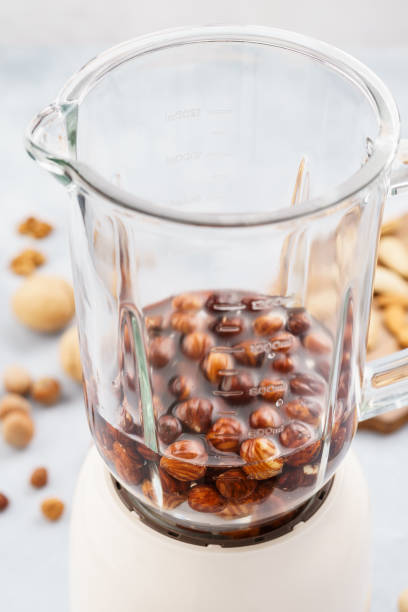 istock Blender with soaked hazelnuts for making nut milk. 1135037240