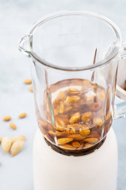 istock Soaked almonds in blender. Making vegan nut milk. 1135037385