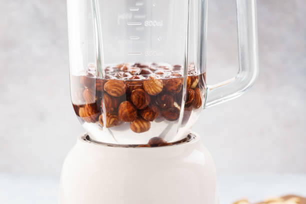 istock Soaked hazelnuts in blender. Making vegan nut milk. 1135037425