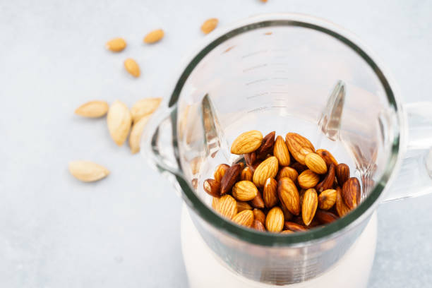 istock Soaked almonds in blender. Making vegan nut milk. 1135037536