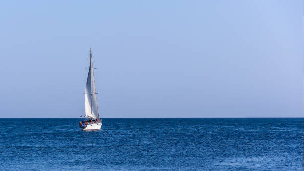 istock Sailing yacht in the blue sea 1135038818