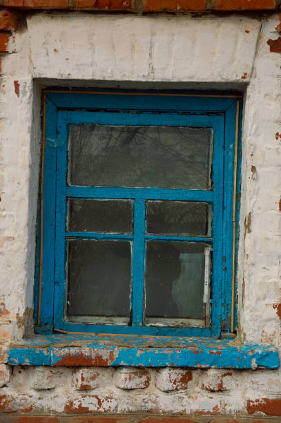 istock House window in a red brick wall 1135041636