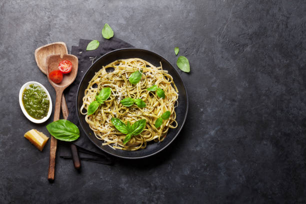 istock Spaghetti pasta with pesto sause 1135041817