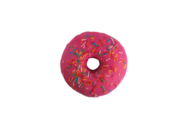 istock Appetizing donut in a pink glaze with multi-colored sprinkle on a white background. Isolated. 1135043766