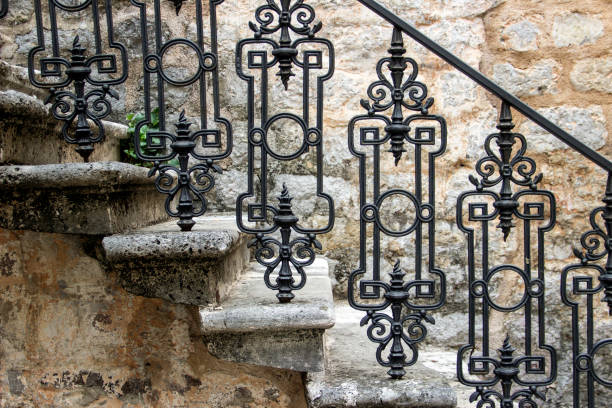 istock Antic stone stairs with wrought iron railings 1135043875