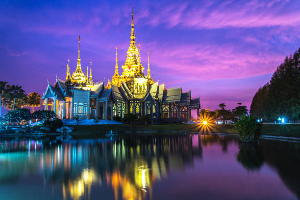 istock beautiful temple thailand dramatic colorful sky twilight sunset shadow on water reflection with light 1135046844