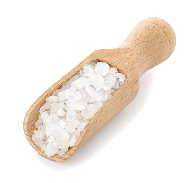 istock sea salt in wooden scoop 1135047683