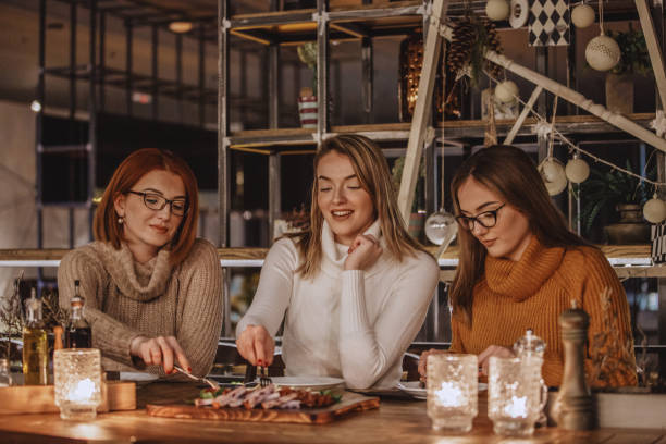 istock Mother and daughters having delicious appetizer 1135047803