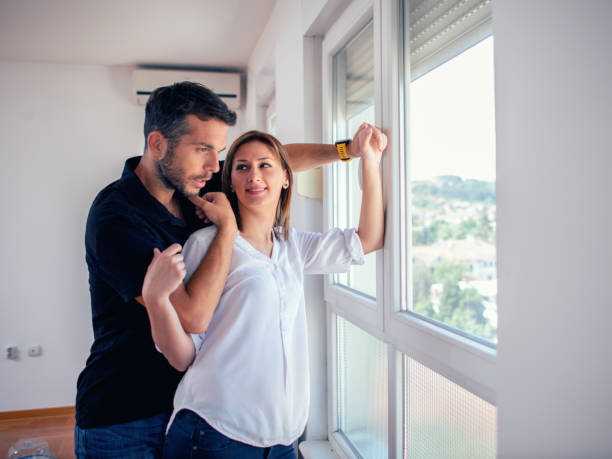 istock Happy couple in new home 1135050352