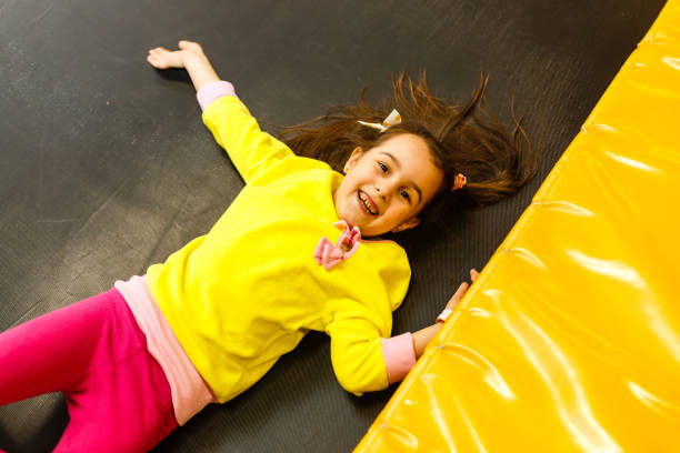 Children playing on a inflatable trampoline