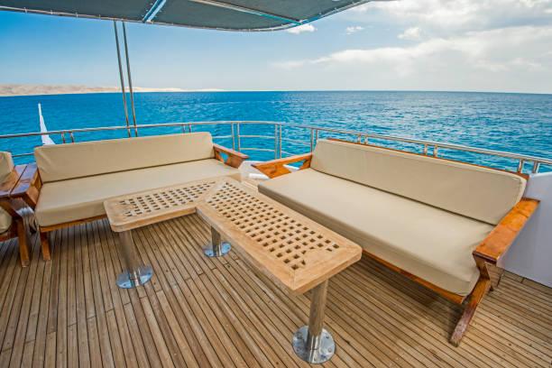 istock Table and chairs on deck of a luxury motor yacht 1135051166