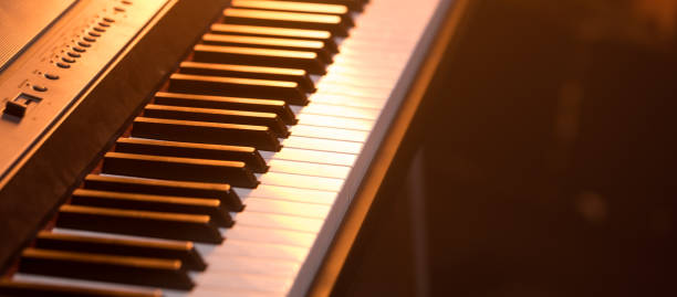 istock piano keys close-up, on a beautiful colored background 1135051329
