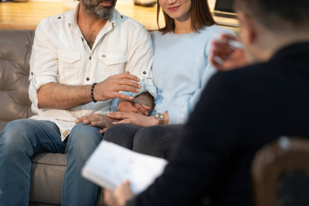 istock Counseling Session psychiatrist's talking to couple client 1135054404