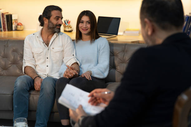 istock Counseling Session psychiatrist's talking to couple client 1135055863