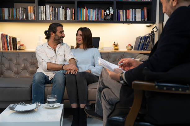istock Counseling Session psychiatrist's talking to couple client 1135055945
