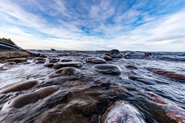 istock low perspective over icy rocks in lake 1135057520