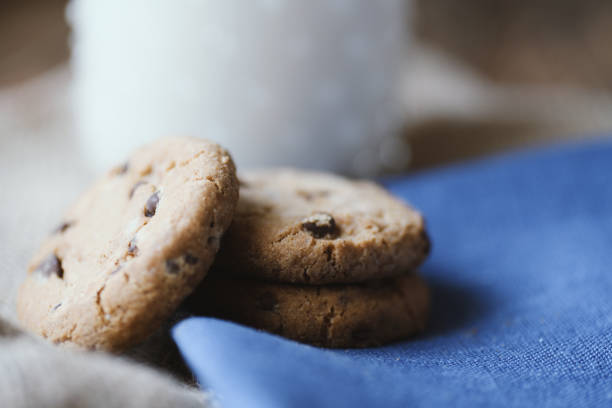 Stack of Chocolate chip cookie and glass of milkStack of Chocolate chip cookie and glass of milk