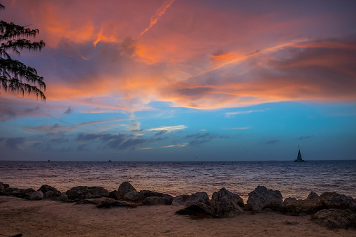 A very romantic seaside sunset with orange and blue cloudy sky in Florida Keys
