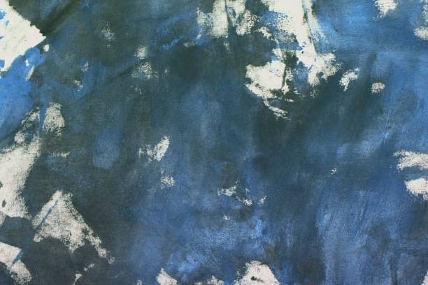 istock abstract vintage randomly painted canvas, fabric with color paint spots and blots texture for design purposes. 1135058989
