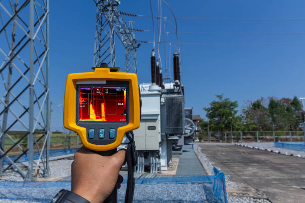 Thermoscan(thermal image camera), Industrial equipment used for checking the internal temperature of the machine for preventive maintenance, This is checking The Transformer stock photo